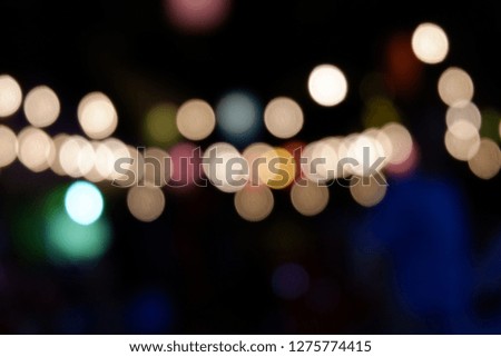 Defocused and blurred gold light bokeh for abstract background.