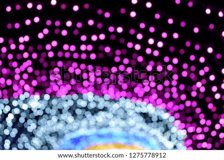 Defoused pink and blue light bokeh for abstract at night