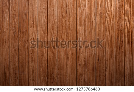 Brown wood texture background coming from natural tree. Wooden panel with beautiful patterns. Space for work.