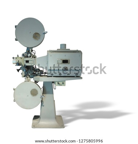Old-fashioned cinema movie vintage film projector isolated on white background
