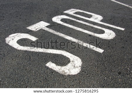 Road marking stop sign
