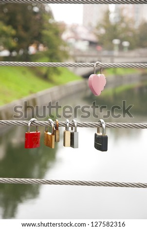 Love locks locked on the fence of the bridge in Ljubljana, Slovenia