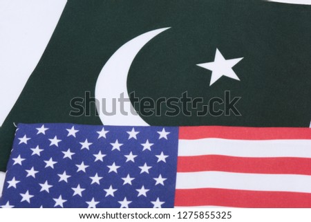 Flag of Pakistan and USA on isolated background.