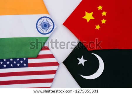 Direction of USA and India flags moving on one direction and China, Pakistan showing opposite direction on isolated background.