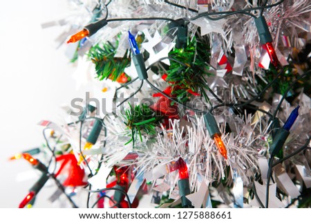 Decorated Chrismas tree with Red ball and Colorful ornament Isolated on white background with copy space