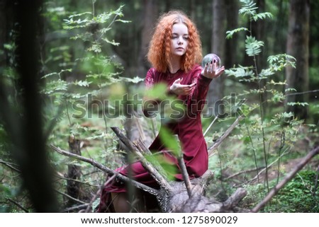 Witch holds a ritual in the depths of the forest
