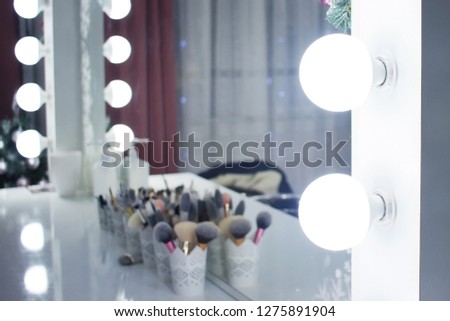 lighting the mirror in the beauty salon, make-up artist place. Royalty-Free Stock Photo #1275891904