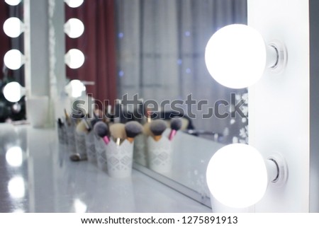 lighting the mirror in the beauty salon, make-up artist place. Royalty-Free Stock Photo #1275891913