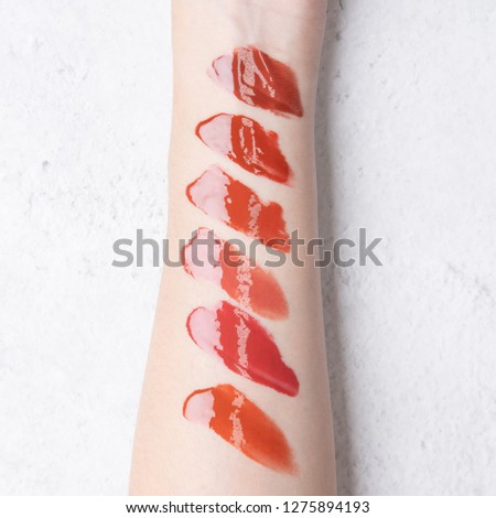 lip gloss shiny lipstick swatch on arm