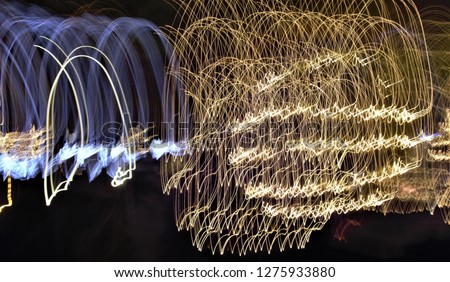 abstract photographs of action light painting, tribute to Jackson Pollock, Abstract photographic expressionism, painting with light, abstract photographic sweeps, night photo, christmas lights, art,