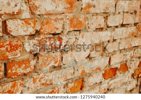 The wall is made of bricks. Background