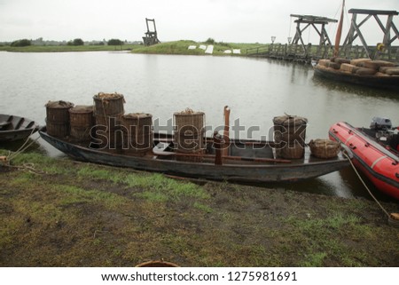 old wooden row boats Royalty-Free Stock Photo #1275981691