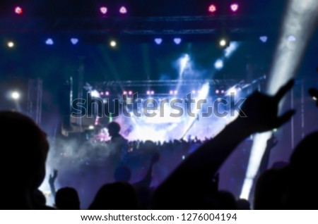 Blurred image, a group of young people enjoy the party one night
