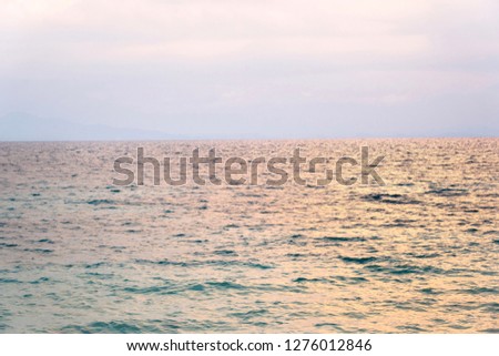 Soft wave of blue ocean.Empty tropical sea background. Horizon with sky.Summer Holiday,Vacation,Day off,Travel Concept.
