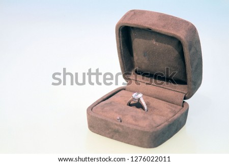 expensive diamond glittering silver ring in a luxury box