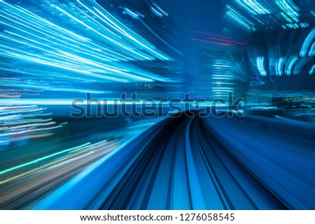 Motion blur from Yurikamome Line moving inside tunnel in Tokyo, Japan

