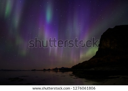 Aurora borealis in very rare purple colours at Nordskot, Nordland, Norway