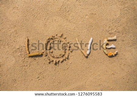Summer holiday beach with love  text by seashell on white sand beach Image For Love summer holiday vacation travel Concept