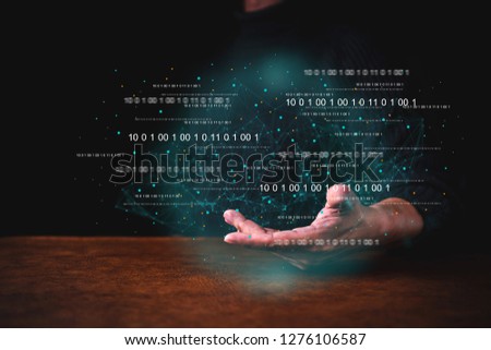 ai big data ideas concept business man hand show technology hologram  in hand dark blackground