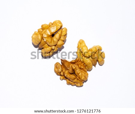 Walnuts isolated on white background. Walnut. Walnut kernel. Nut isolated on white. With clipping path.Tasty walnuts on white background 