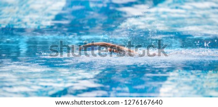 Image of man swimming in free style in the pool, banner