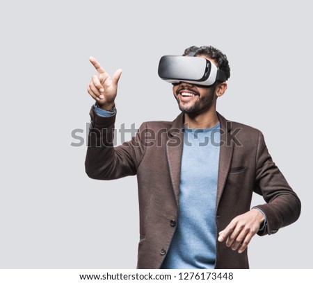 Young man using virtual reality headset. VR, future, gadgets, technology concept