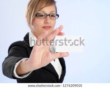 Woman showing her business card