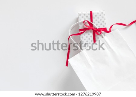 Paper bag and  gift on white background. Valentine day, Mother's Day 