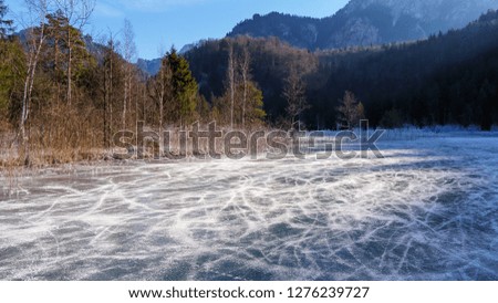 Winter landscape with lake and ice