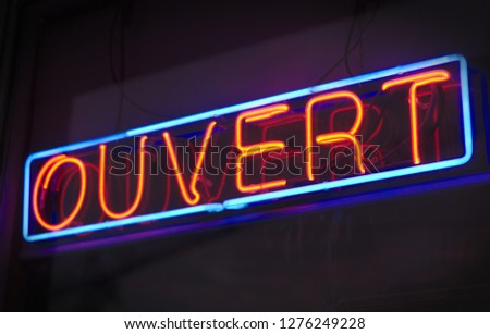 ouvert french open neon sign illuminated glowing commercial advertising