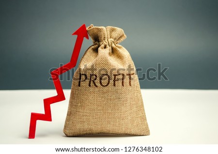 Money bag with the word Profit and an up arrow. Concept of business success, financial growth and wealth. Increase profits and investment fund. Saving money and accumulation. Royalty-Free Stock Photo #1276348102