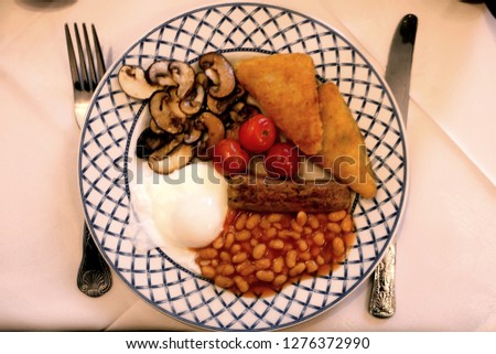 Flatlay picture of english breakfast with poached egg serve in Conwy, North Wales.