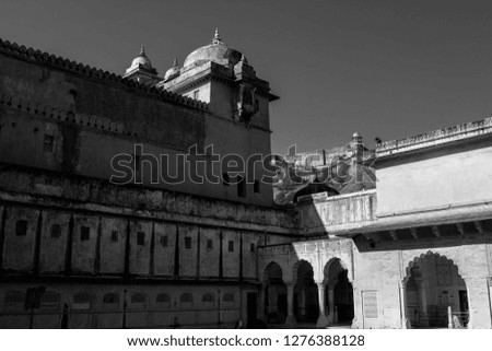 The black and white traditional buildings of Amber fort in Jaipur, India.