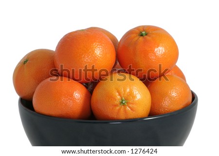 A bowl full of vitamin C. Isolated on white. Royalty-Free Stock Photo #1276424