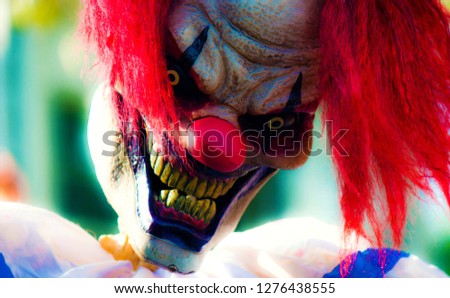 creepy clown with red hair Halloween
