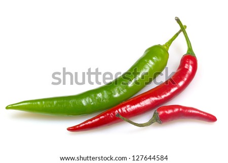 Group of green and red chilli peppers. Isolated.