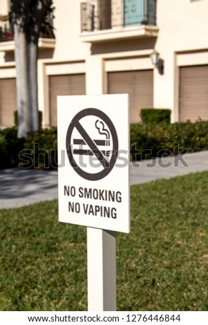A sign indicating that there is no smoking or vaping allowed.