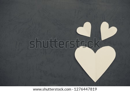 Heart shaped paper cutting design card with empty space.
