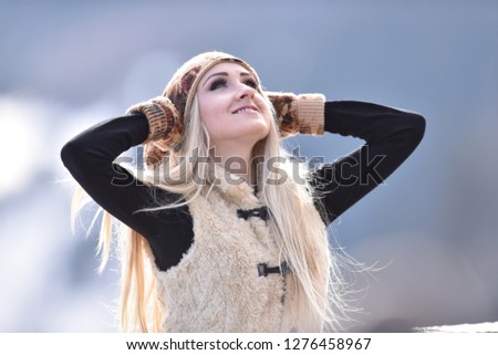 young pretty woman portrait outdoor in winter