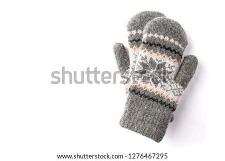 Warm mittens isolated on white background.