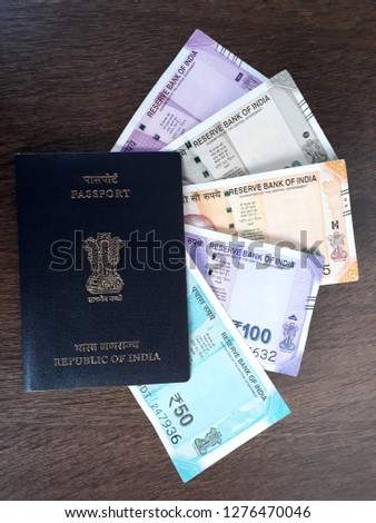 INDIAN PASSPORT AND CURRENCY