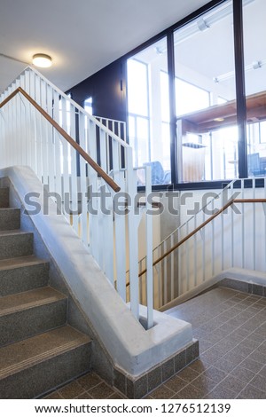 in an old building is located this beautiful staircase