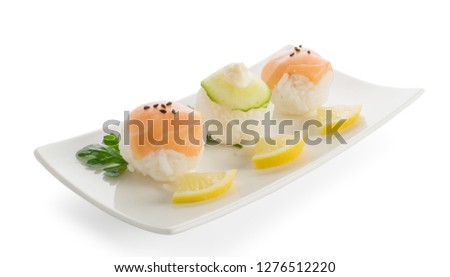 Little Nigiri Sushi or Temarizushi with Salmon and Cucumber on Light Background Close Up. Rice Balls with Raw Red Fish on White Plate