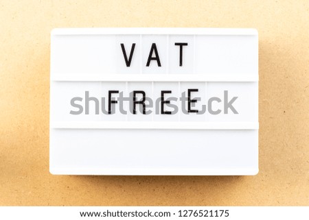 Light box with word vat free on wood background