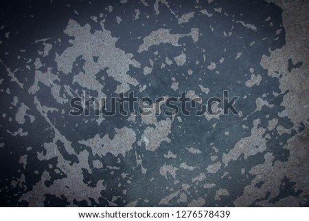 Old cement background painted with vintage cracks. Used for making wallpaper.