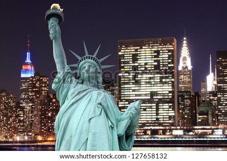 Manhattan Skyline and The Statue of Liberty at Night, New York City