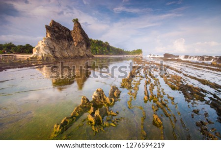 Majestic view of Tanjung Layar beach at Sawarna beach, Indonesia. Nature faraming composition. 