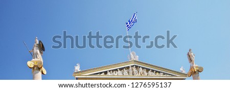 National Academy of Athens neoclassical building with Athena and Apollo statues. Iconic neoclassic Academy of Athens. historic center in Attica, Greece