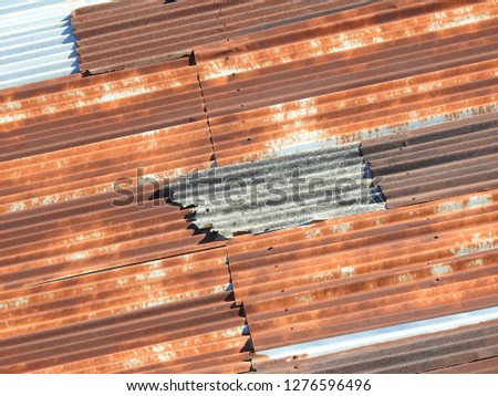 Old galvanized house roof Royalty-Free Stock Photo #1276596496