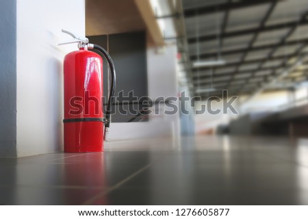 Fire extinguisher install in the building.Security system.